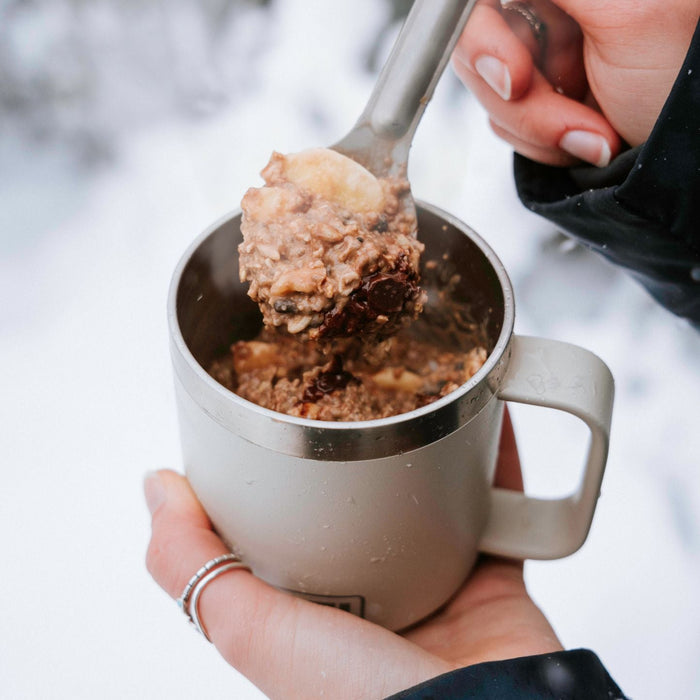 Hot muesli choco-banana in jar outside